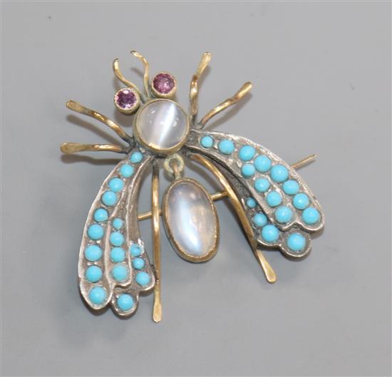 A yellow and white metal, moonstone, ruby and turquoise set bug brooch, 31mm.